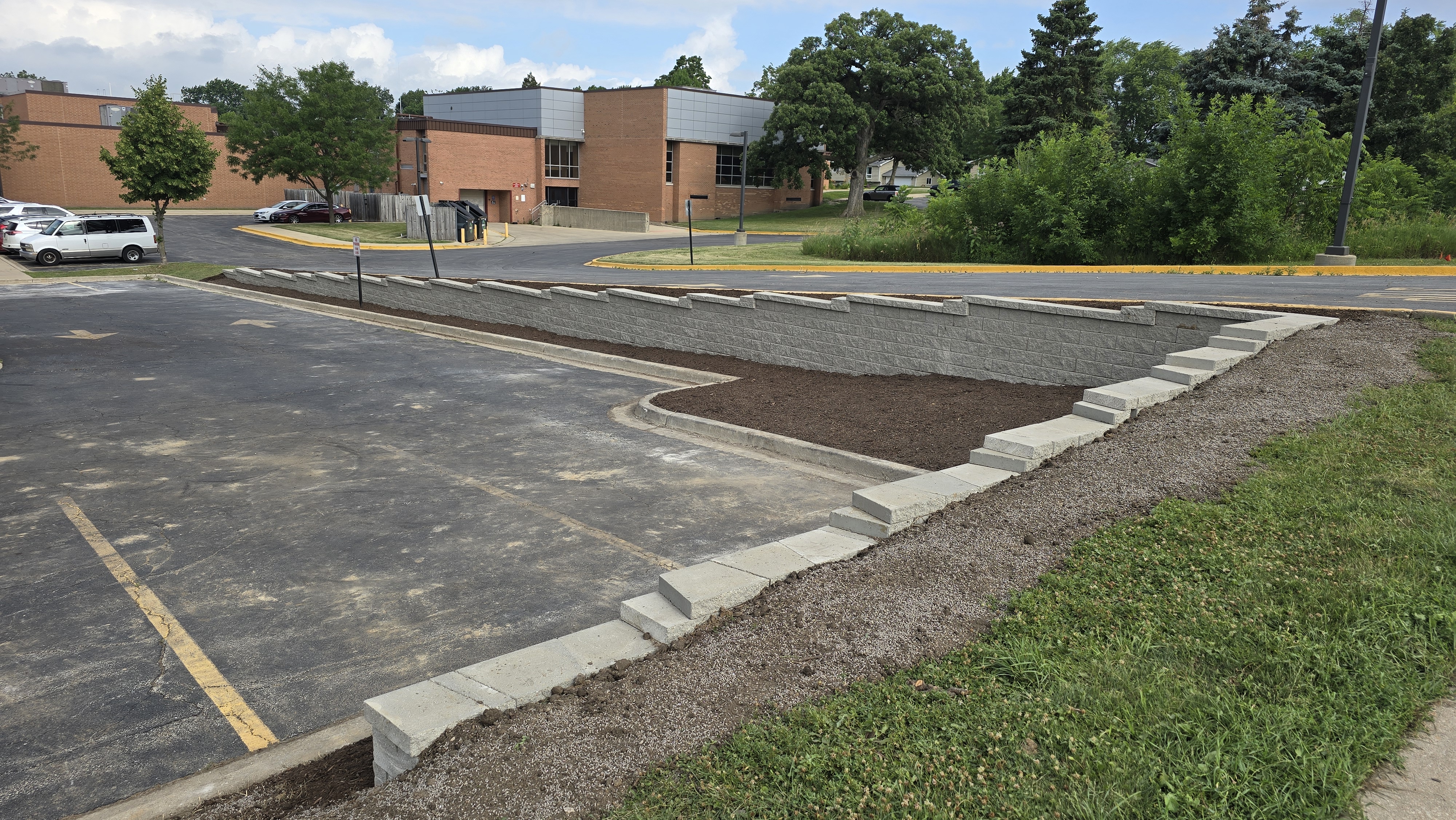 Large commercial retaining wall, West Chicago, IL — B&L Landscape drainage