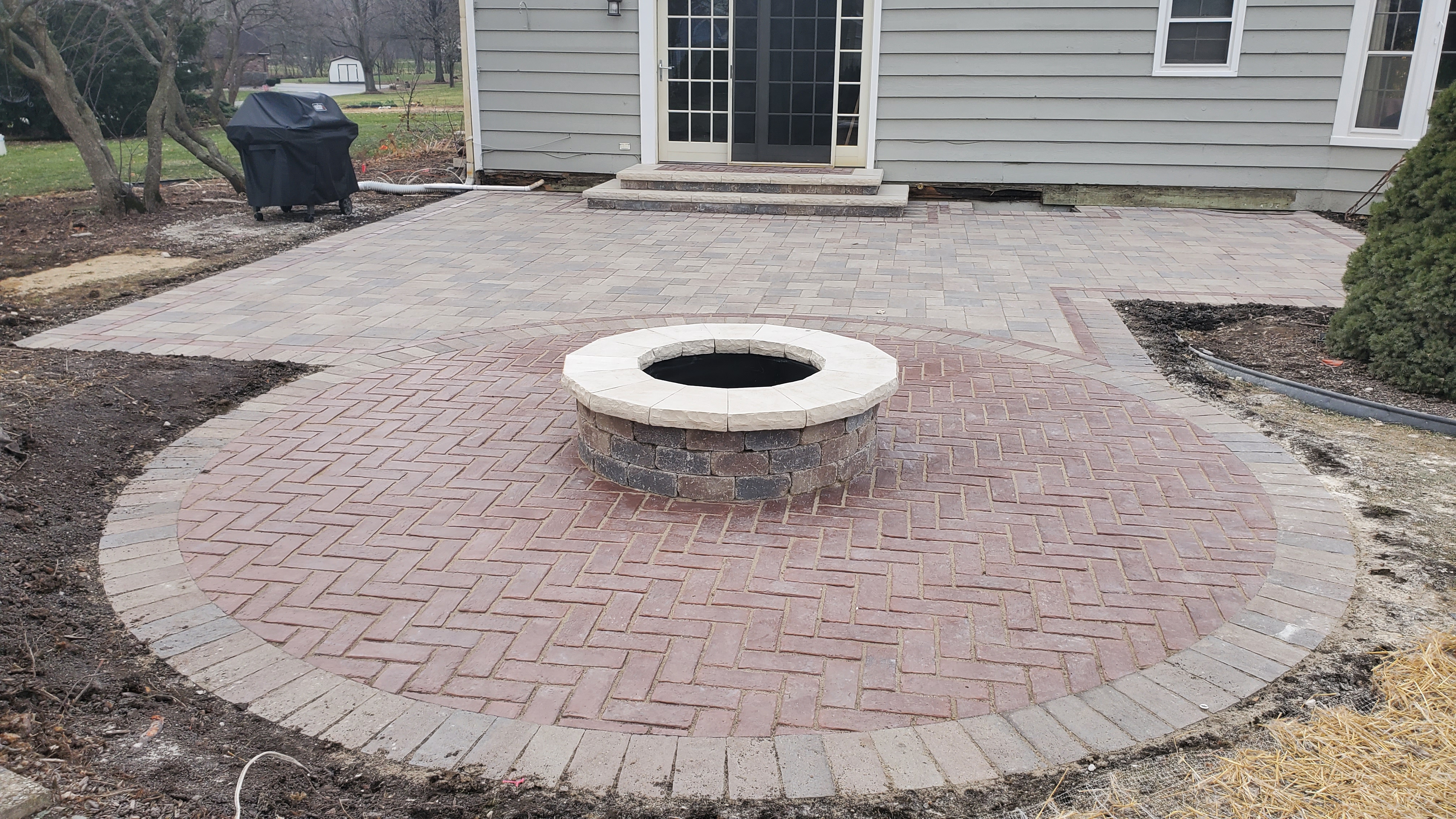 Back patio with firepit, St. Charles, IL — B&L Landscape