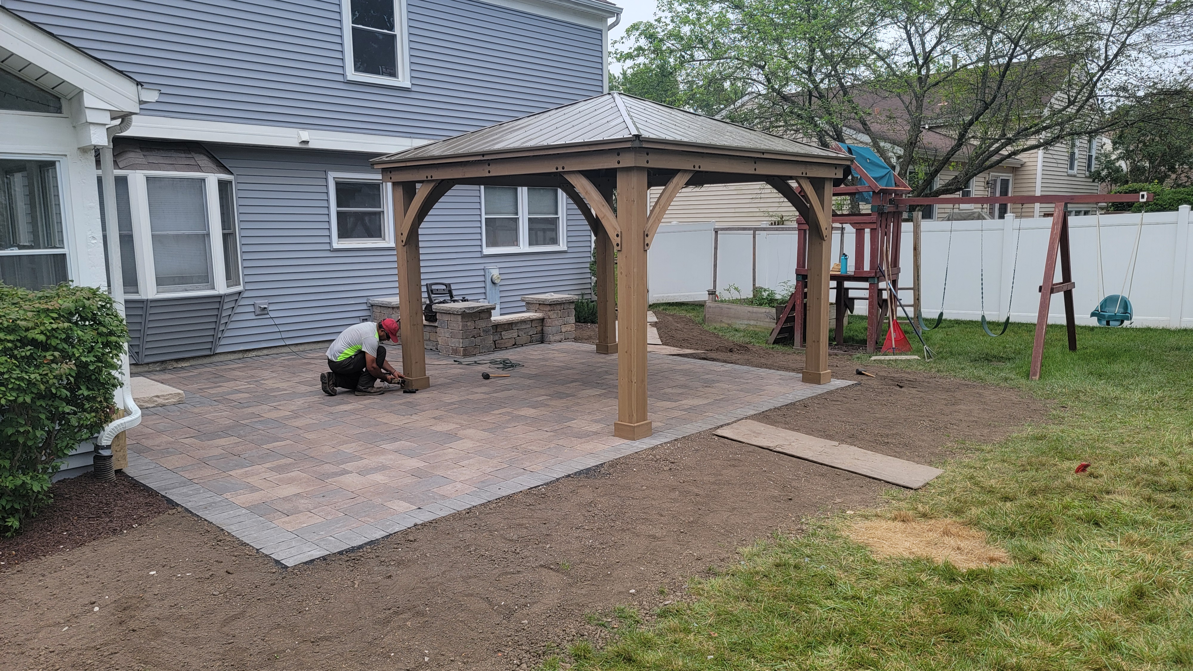 Paver patio with seat wall and pergola, Lombard, IL — B&L Landscape