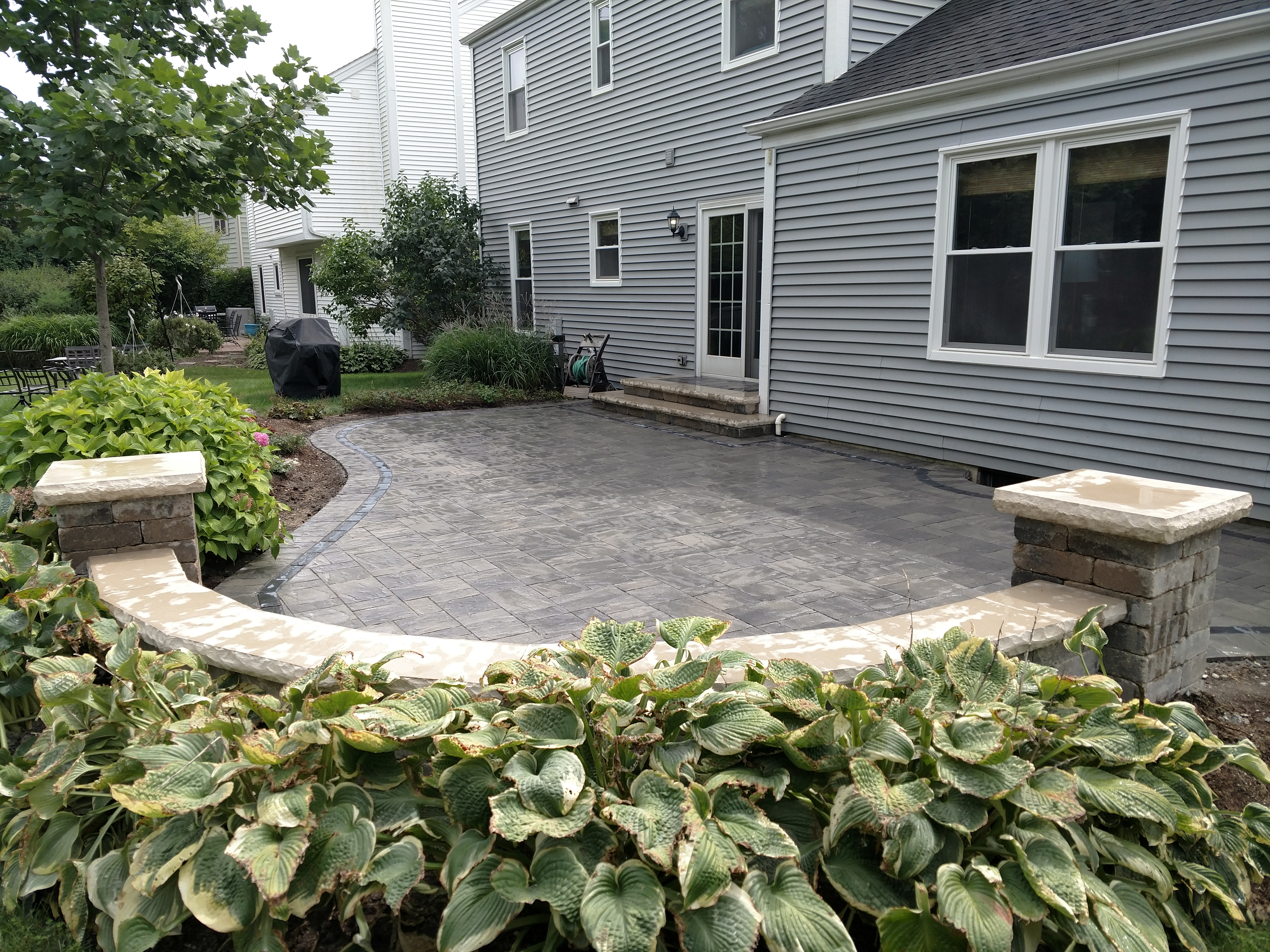 Paver patio with seat wall, St. Charles, IL — B&L Landscape