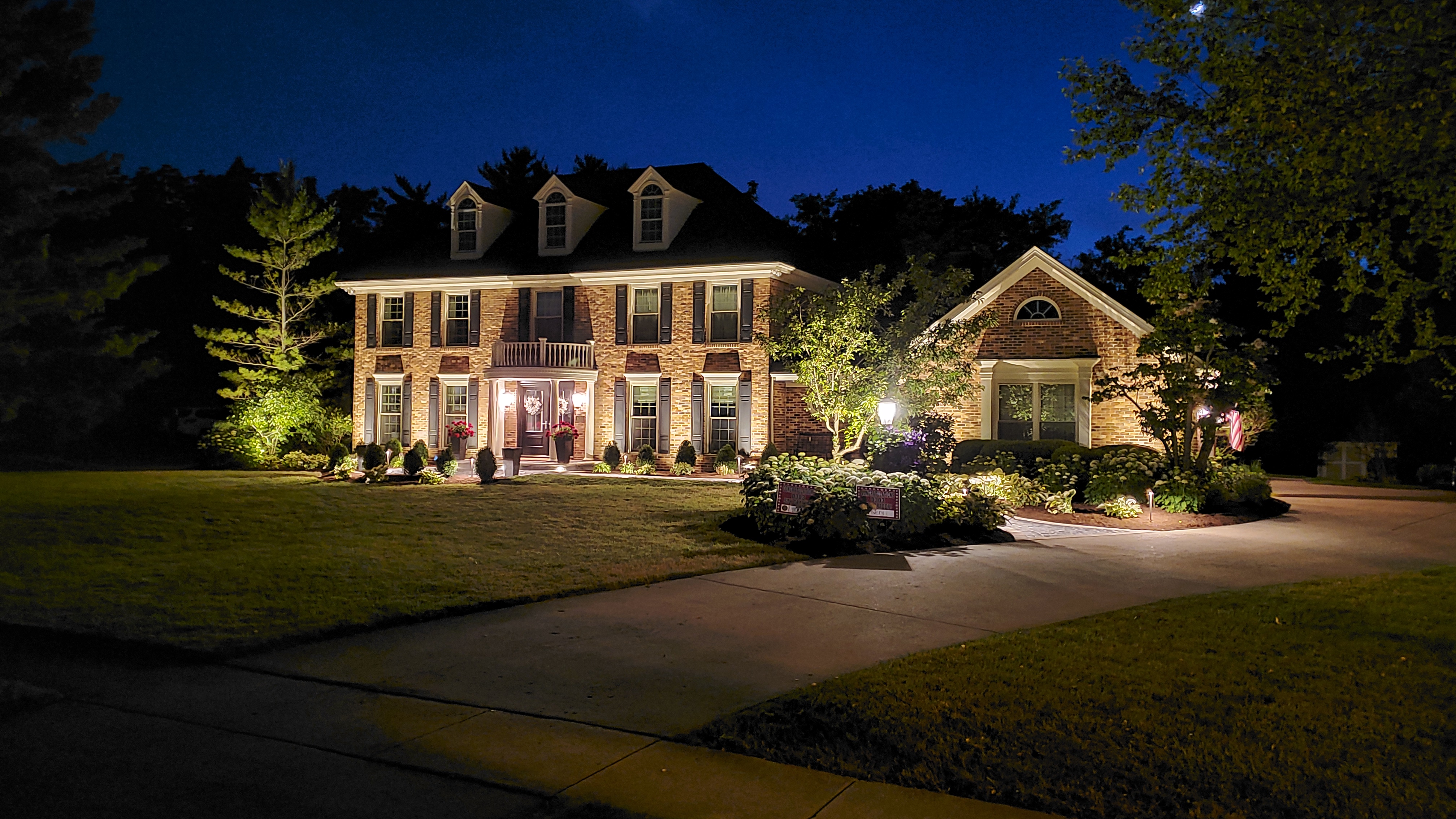 Front of house at night with landscape lights (alternate), St. Charles, IL — B&L Landscape